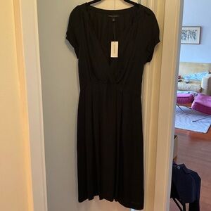 Silk dress with slip lining navy size 8 short cap sleeveless midi length